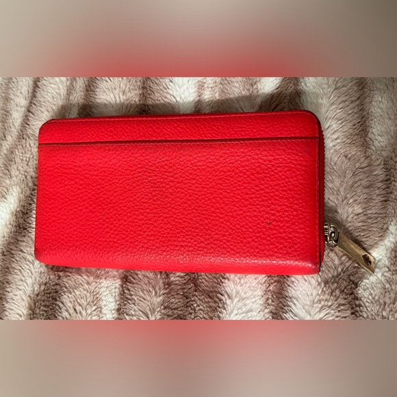 Adorable Kate Spade pebble leather coral zip wallet. Used, but good condition. - Picture 2 of 16